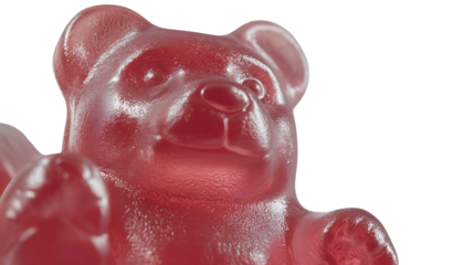 Close up gummy bear candy with a translucent, chewy texture, reflecting light and appearing deliciously sweet.