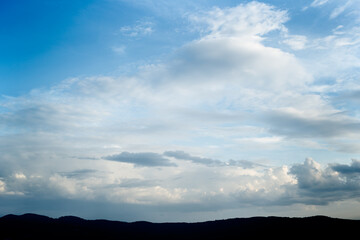 Serene Sky Over Mountain Ridge