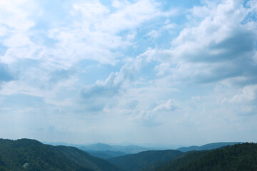 Serene Mountain Landscape Under Cloudy Sky