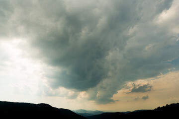 Storm Clouds Over Mountain Landscape