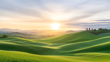 Sunset over rolling green hills with countryside landscape and distant trees.