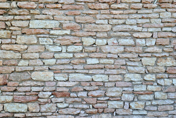 Old Stone Wall in Close Up with Textured Grey Rock 