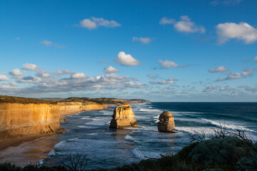 Stunning view of coastal monoliths known as The Twelve Apostles, in beautiful late afternoon light.