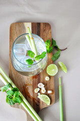 Top view of Fresh Lemongrass Drink with Fresh Ingredient on Wooden Board