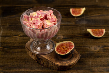 creamy sweet ice cream and sliced red fig fruits