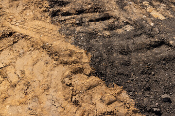 a deep hole in the ground on the site of which a highway was started