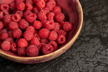 fresh red raspberries on the table