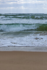 The beach at high tide in the early morning, photographed in Haitang Bay, Sanya, Hainan, China.