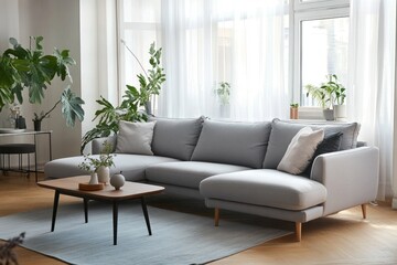 A contemporary living room space with a comfortable gray sectional