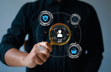 (KYC) Businessman holding magnifying glass and identity verification symbol to increase financial...