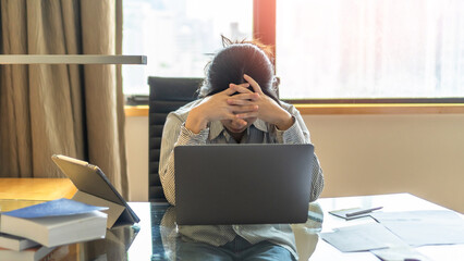 Panic attack working woman, stressful depressed student or businesswoman, burnout person with anxiety disorder mental health illness, headache and migraine, sitting in front of laptop computer desk