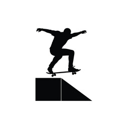 silhouette of a skateboarder jumping