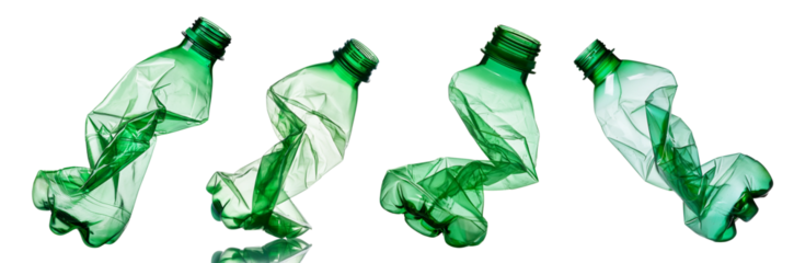 Crushed green plastic bottles showcasing recycling and waste management practices.