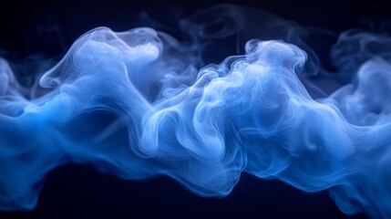 Obraz premium Ethereal blue smoke forms mesmerizing shapes, captivating the viewer with its fluid movement in a shadowy environment