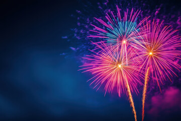 Bright colorful fireworks exploding in night sky create stunning display of vibrant colors and patterns, evoking feelings of joy and celebration