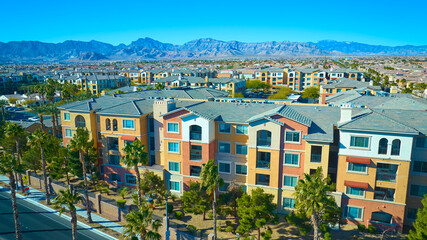 Aerial of Modern Desert Residential Area with Mountain Backdrop