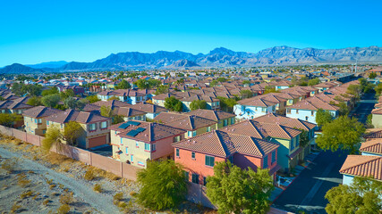 Aerial of Las Vegas Suburban Homes with Mountain Backdrop © Nicholas J. Klein