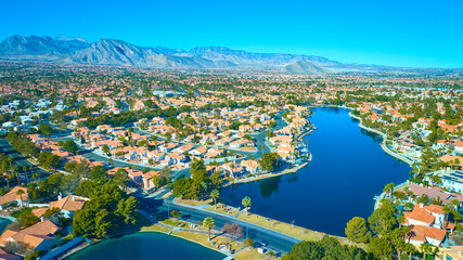 Fototapeta premium Aerial of Suburban Lake Community in Desert Landscape
