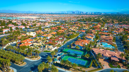 Aerial of Las Vegas Suburb with Palm-Lined Streets and Tennis Courts © Nicholas J. Klein