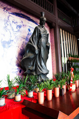 Ancient Quyuan Chinese poet statue or antique aristocrat Qu Yuan monument and building architecture...