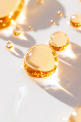 Golden retinol molecules encapsulated in pearls on luxurious white background, reflecting light beautifully