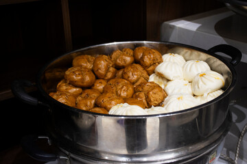 Line traditional chinese food gourmet or local cuisine meal buffet breakfast stuffed dumpling steamed bun and mantou in dining room for travelers guests use service taste eat tasty in Hubei, China