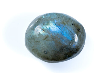 Polished Natural Labradorite Stone Showing Iridescent Blue Shine on White Background