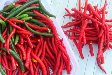 Fresh red chilies arranged on the table, red chilies are a commodity that is much in demand as a cooking spice