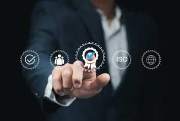 Quality control Businessman touch on ISO  sign or tick mark with document icon for approve quality assurance and guarantee concept, online approve paperless and quality assurance concept.