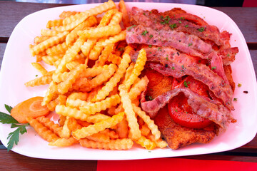 Steak and french fried german style at local restaurant in Heidelberg, Germany