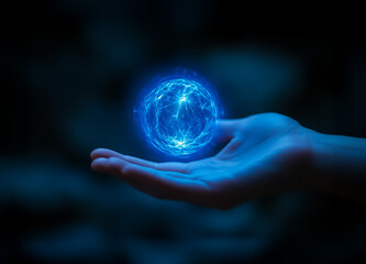 A glowing orb of pure energy floats mid-air, emitting swirling blue electric currents above a gently cupped hand in a dark setting.