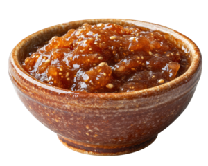 small dish of fig jam with visible seeds, rich and textured, perfect for spreading on toast or pairing with cheese. Enjoy sweet and fruity flavor
