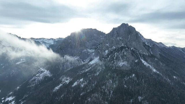 uno spiraglio di sole sulla va di Fassa, Trentino, Italia