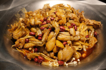 savory stir-fried bullfrog cuisine in pot