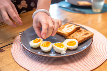 making morning fresh eggs breakfast and toasts
