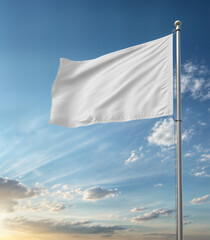 An image of a White flag isolated on a blue sky
