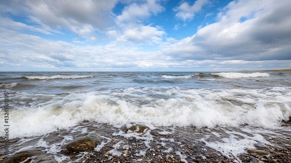 Aufkleber Serene ocean waves crashing on a rocky shore under a bright blue sky with fluffy clouds creating a relaxing atmosphere : Generative AI