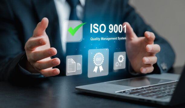Businessman Presenting ISO 9001 Quality Management System Concept