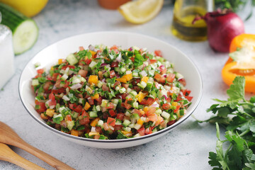 A bowl with traditional Israeli Salad