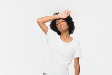 Fototapeta premium Closeup portrait of young african woman girl worried having high blood pressure, suffering from headache migraine massaging temples in period illness, feeling stress isolated on white background