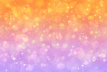 オレンジと黄色のグラデーションのキラキラ背景