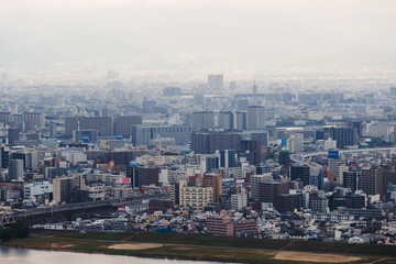 Osaka panorama, aerial cityscape with Yodo Seta River embankment and skyscrapers, Osaka prefecture, Japan, Umeda business district, streets of Osaka downtown center, seen from observation deck
