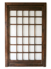 An old brown wooden window frame with a square glass pane, a classic architectural interior design element