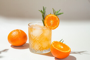 Cocktail with fruit and ice in a glass. Lemonade with ice. Summer cocktail
