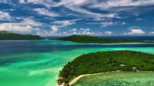 Aerial view of tropical beach with azure water and clouds, Port Vila, Shefa, Vanuatu.