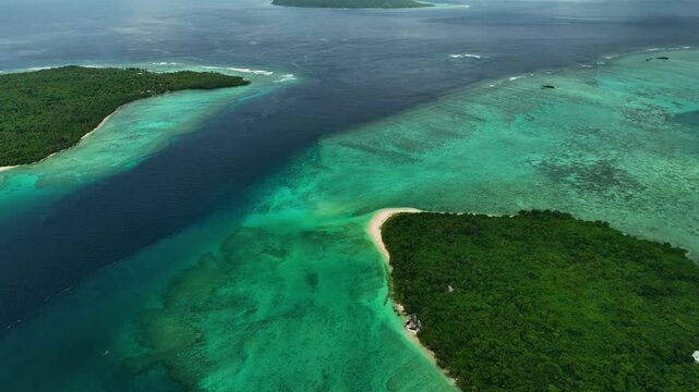 Aerial view of tropical island with turquoise ocean and serene reef, Port Vila, Shefa, Vanuatu.