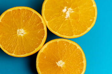 Close-up of cut oranges. Orange juice. Orange diet