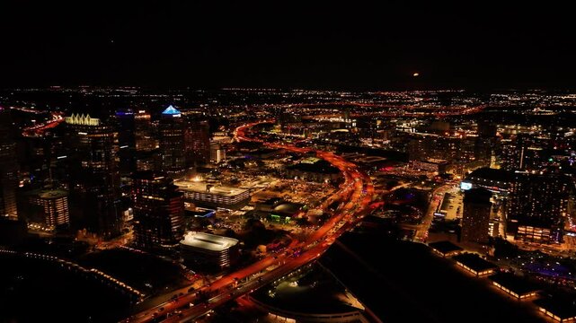 Aerial view of downtown tampa illuminated by vibrant night lights with modern skyscrapers and busy streets, Tampa, Florida, United States.