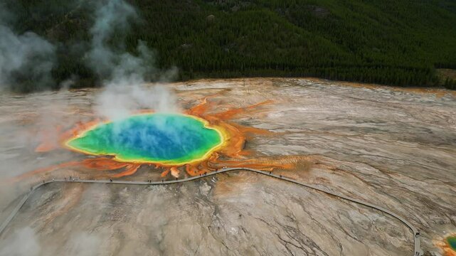 Aerial view of grand prismatic spring with vibrant colors and mist, Yellowstone National, Wyoming, United States.