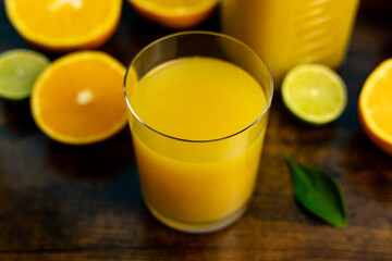 Glass of orange juice view from above.Half an orange and glass of juice close-up
